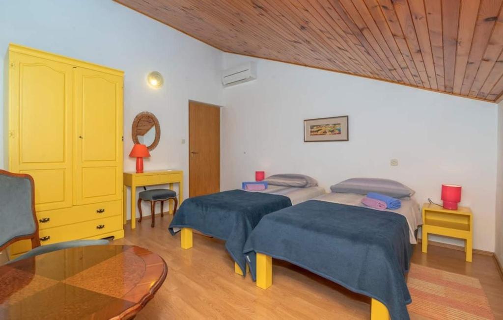 Posteľ alebo postele v izbe v ubytovaní Apartments Nadi