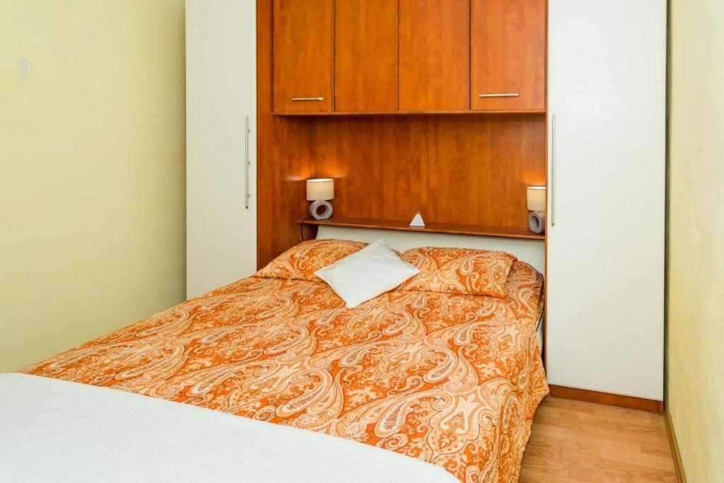 Postel nebo postele na pokoji v ubytování Apartment Angie