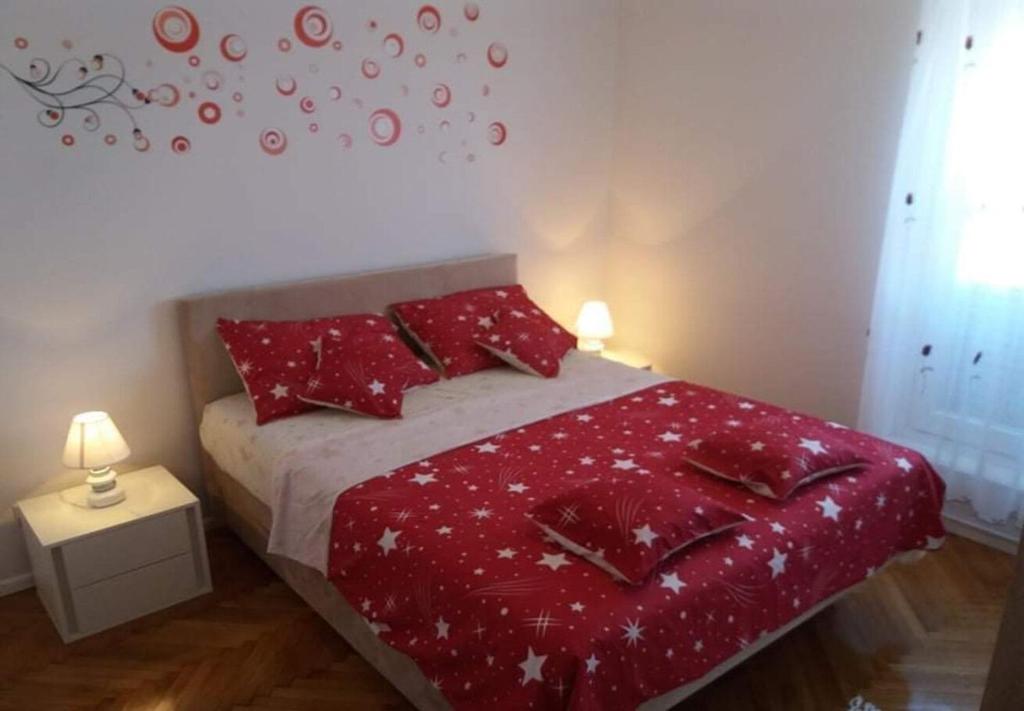 Posteľ alebo postele v izbe v ubytovaní Apartment Mari