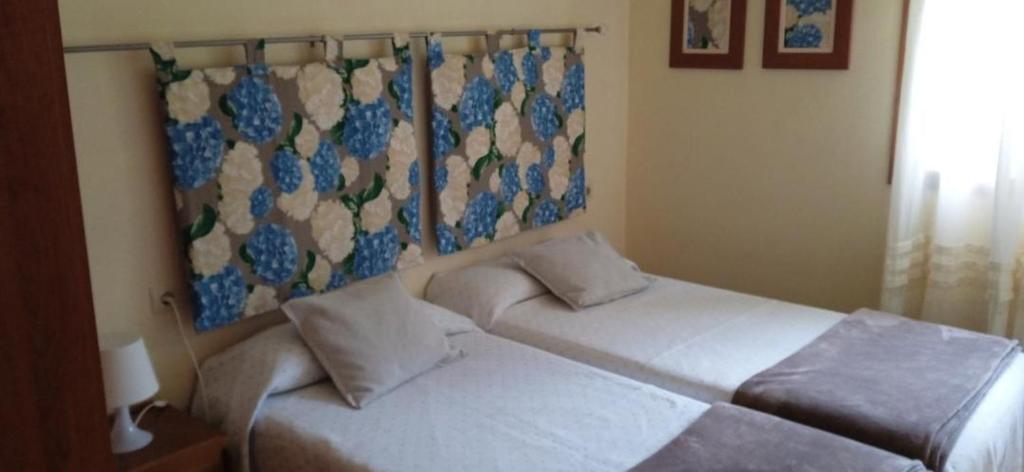 Postel nebo postele na pokoji v ubytování Casita con terreno a 10 minutos del centro de Vigo