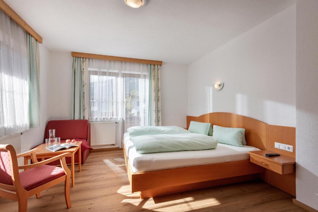 Posteľ alebo postele v izbe v ubytovaní Haus Hanser