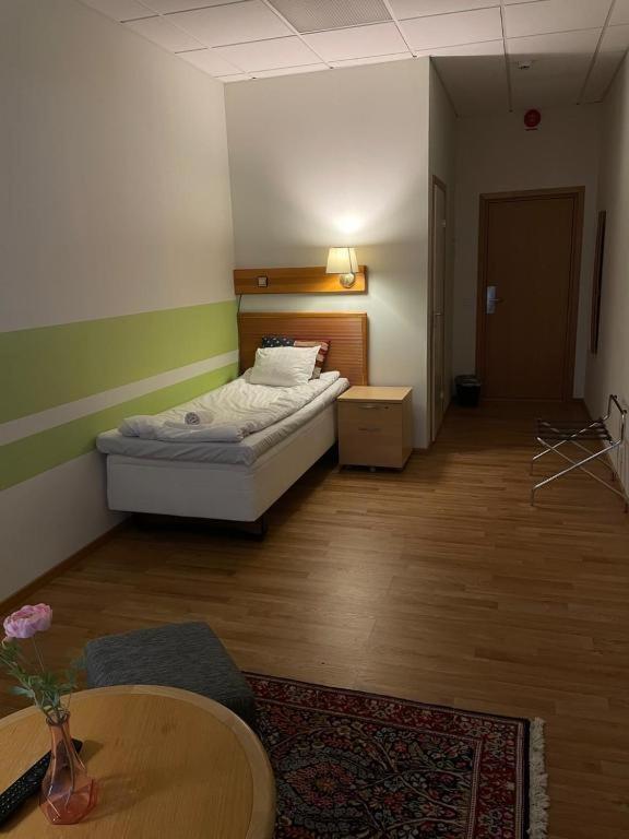 Postel nebo postele na pokoji v ubytování Trestads Värdshus
