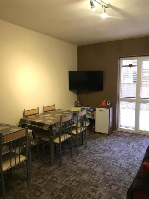 TV a/nebo společenská místnost v ubytování Housing HELLA