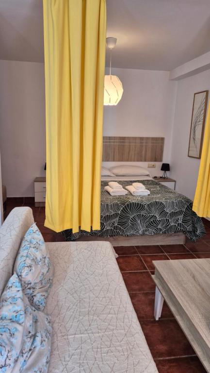 Posteľ alebo postele v izbe v ubytovaní GABISOL Apartments 2