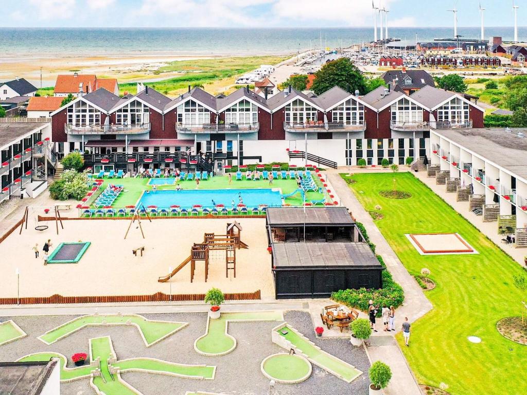 an aerial view of a resort with a swimming pool at 4 person holiday home in Glesborg in Glesborg