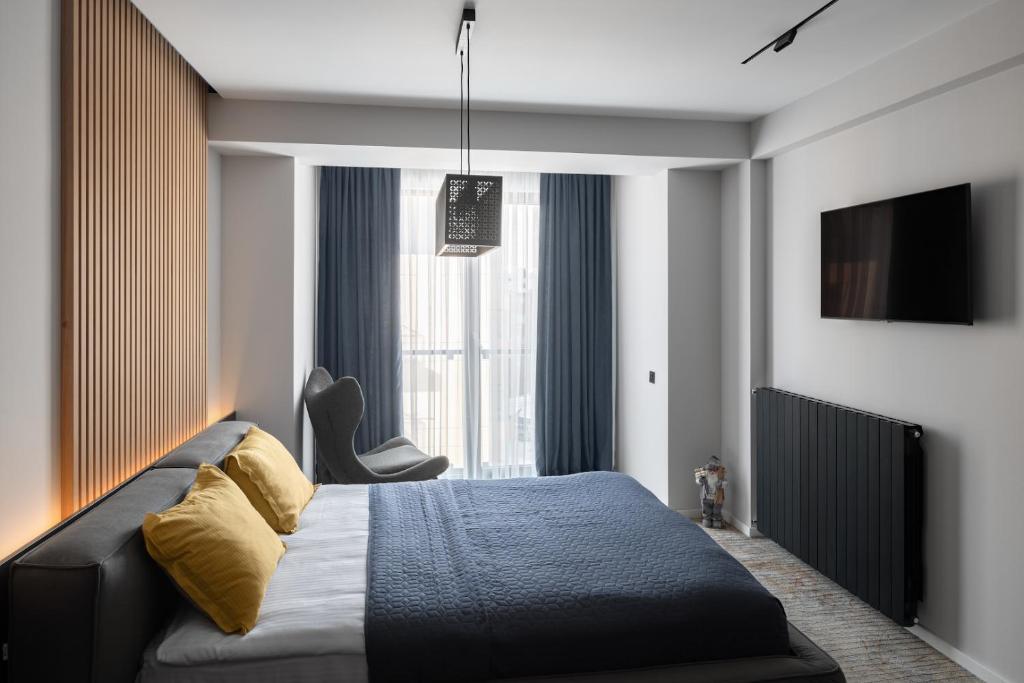 TV a/nebo společenská místnost v ubytování Premium Apartment in New Gudauri