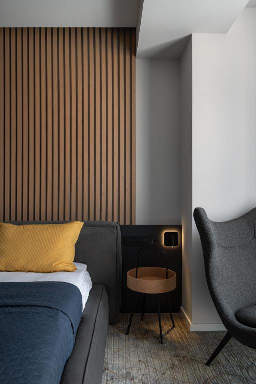 Postel nebo postele na pokoji v ubytování Premium Apartment in New Gudauri
