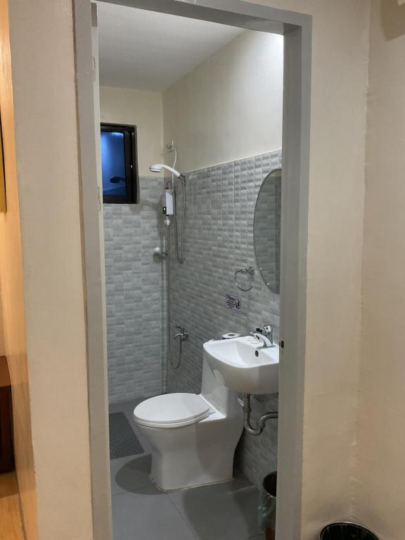 Koupelna v ubytování Belladama Hotel