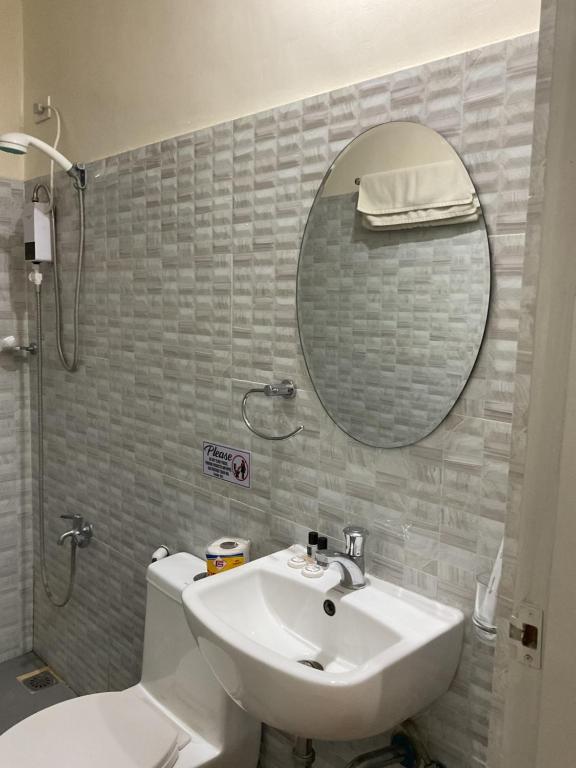 Koupelna v ubytování Belladama Hotel