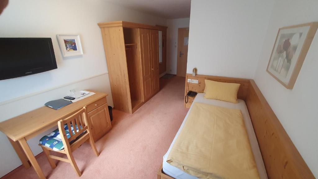 TV a/nebo společenská místnost v ubytování Hotel Garni Dorfblick