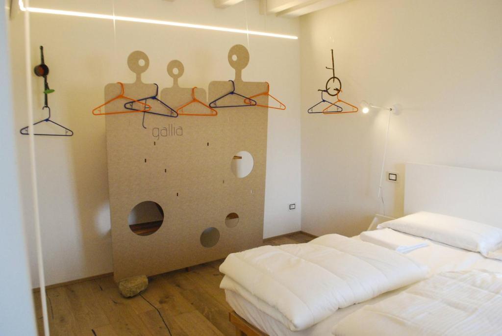 Postel nebo postele na pokoji v ubytování La Corte - Theater Home