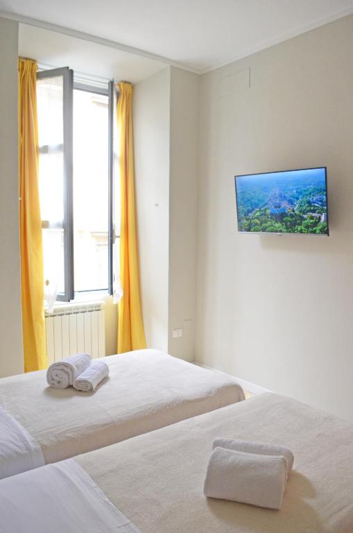 Letto o letti in una camera di Casa Ninetta Caprarola