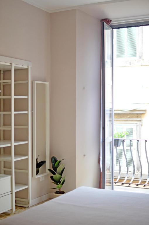 Letto o letti in una camera di Casa Ninetta Caprarola