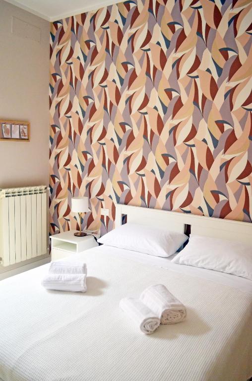 Letto o letti in una camera di Casa Ninetta Caprarola