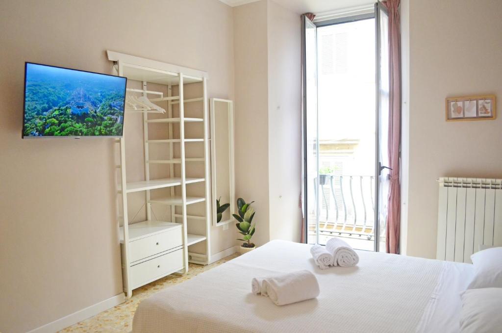 Letto o letti in una camera di Casa Ninetta Caprarola