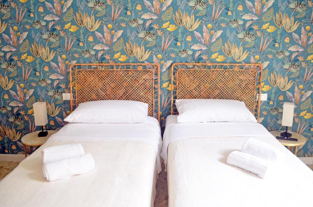 Letto o letti in una camera di Casa Ninetta Caprarola