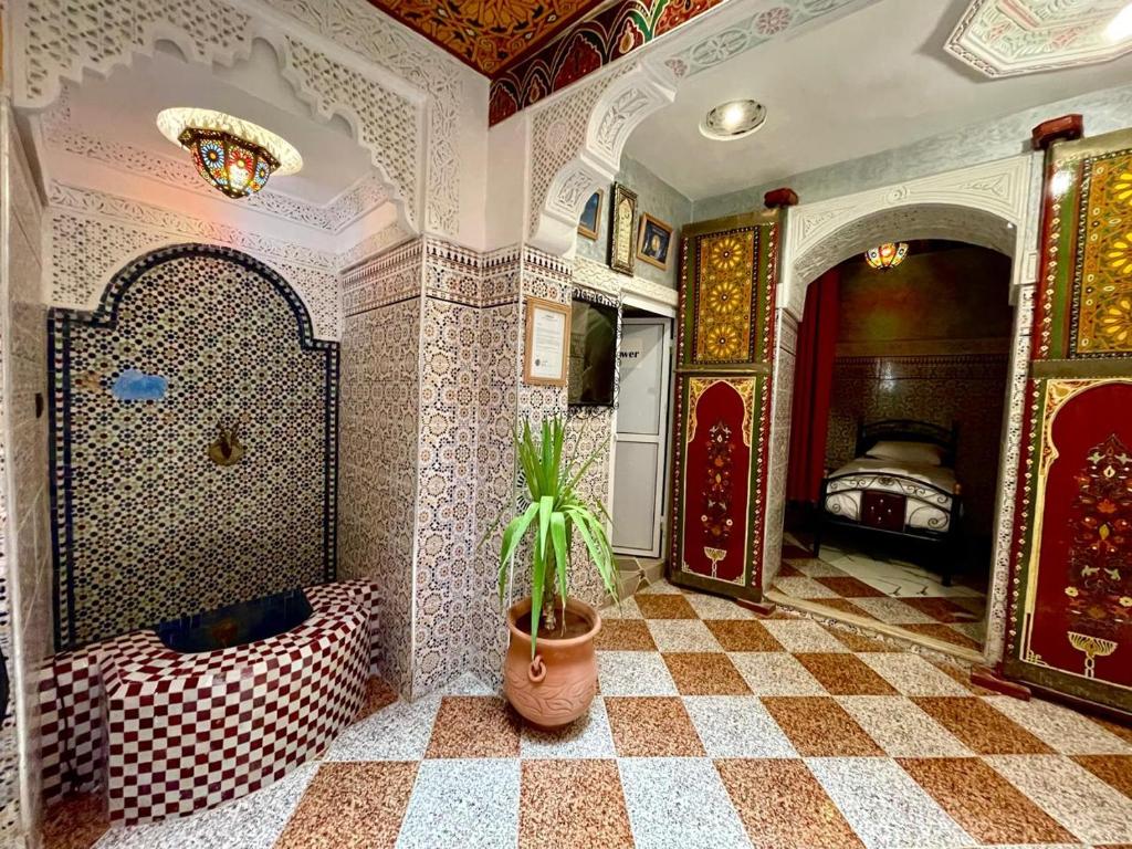 Postel nebo postele na pokoji v ubytování la Kasbah salam