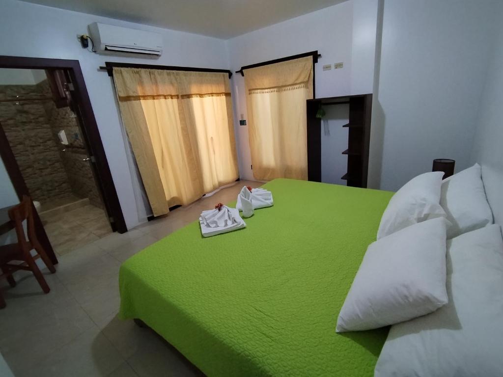 Postel nebo postele na pokoji v ubytování Hotel StarFish