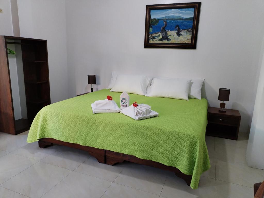 Postel nebo postele na pokoji v ubytování Hotel StarFish
