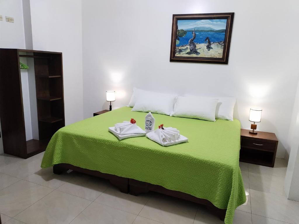 Postel nebo postele na pokoji v ubytování Hotel StarFish