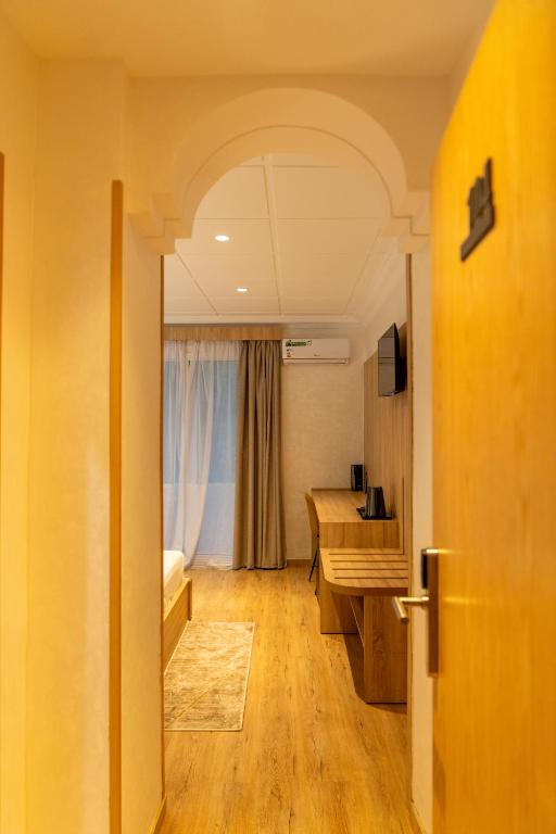 TV o dispositivi per l'intrattenimento presso Hotel Charf