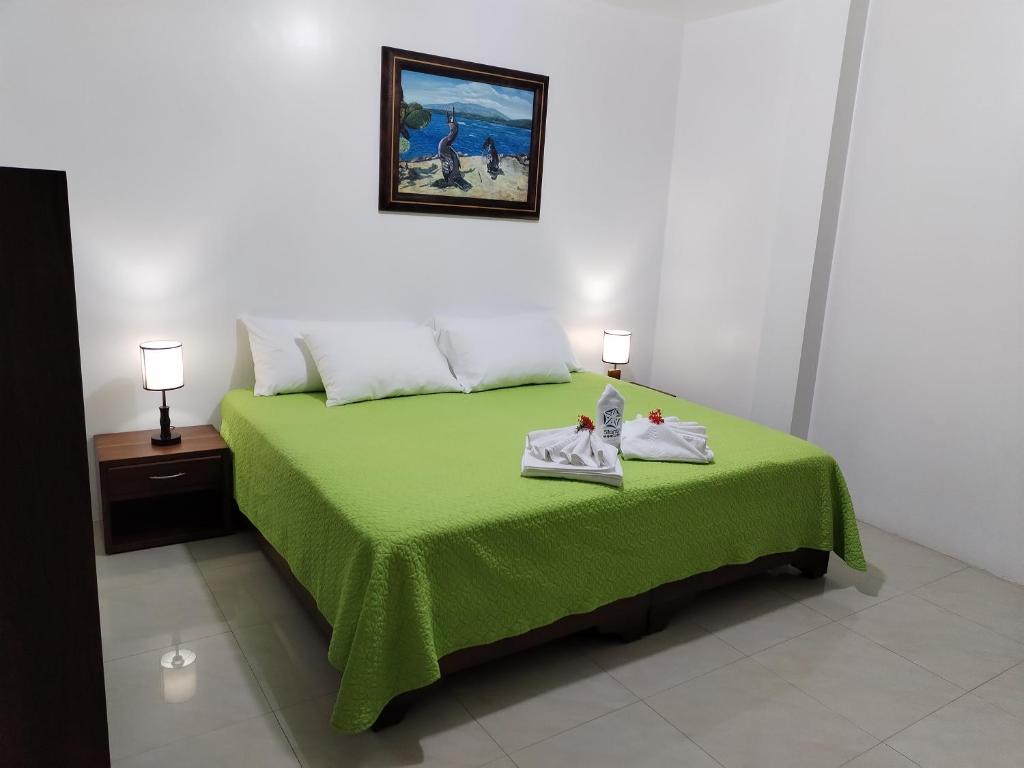 Postel nebo postele na pokoji v ubytování Hotel StarFish