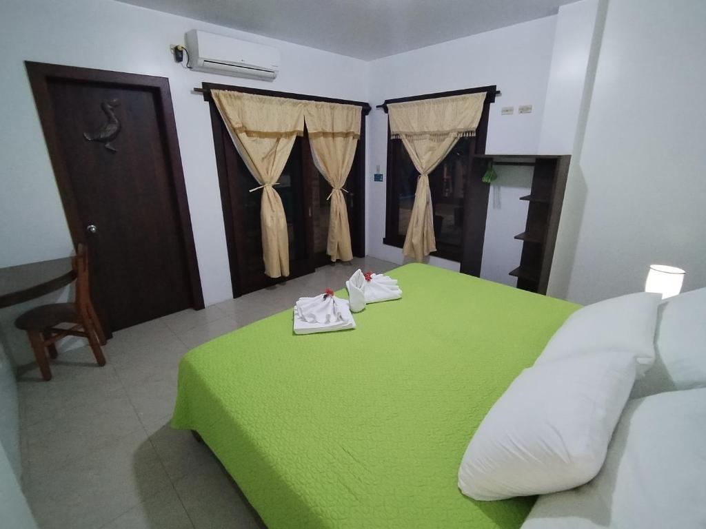 Postel nebo postele na pokoji v ubytování Hotel StarFish