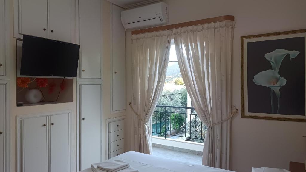 Televizors / izklaižu centrs naktsmītnē Alexadra's house Κάτω Αλμυρή