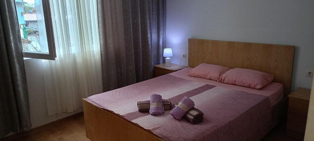 Postel nebo postele na pokoji v ubytování Guest house on Devyatnadtsataya