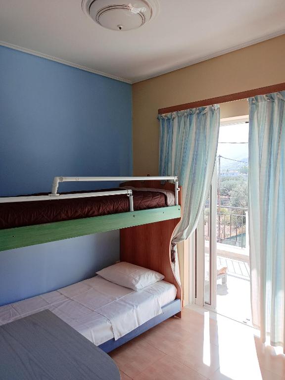 Gulta vai gultas numurā naktsmītnē Alexadra's house Κάτω Αλμυρή