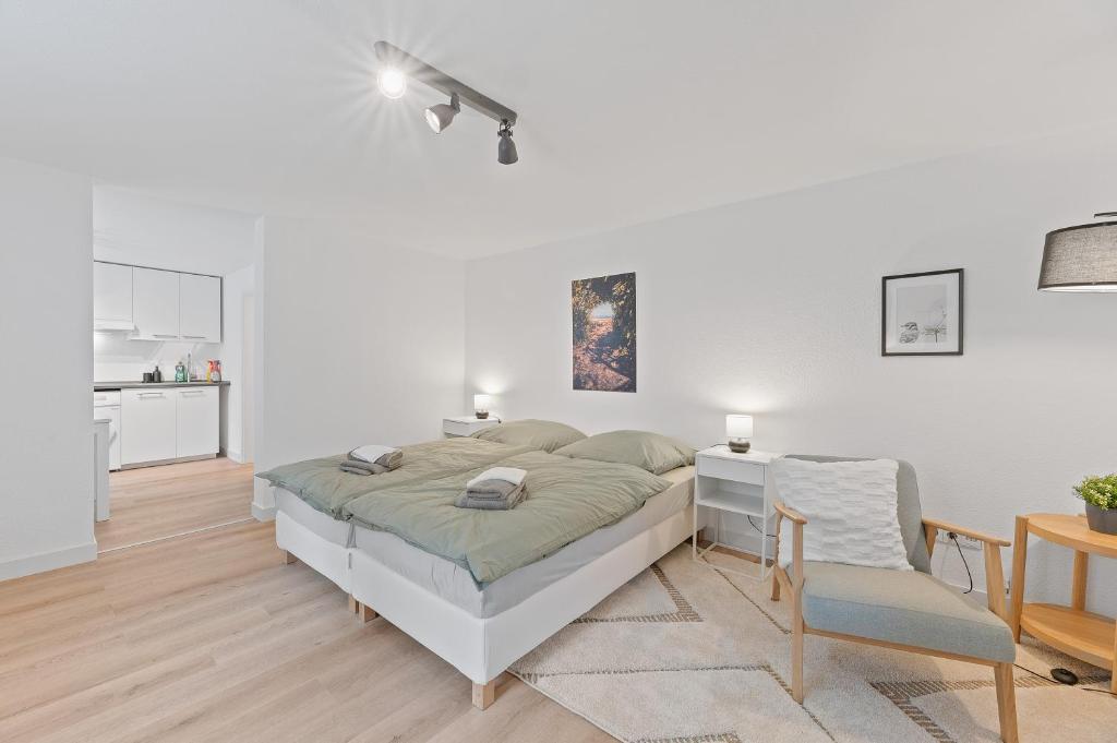 Postel nebo postele na pokoji v ubytování Wohlfühl-Apartment Weissach