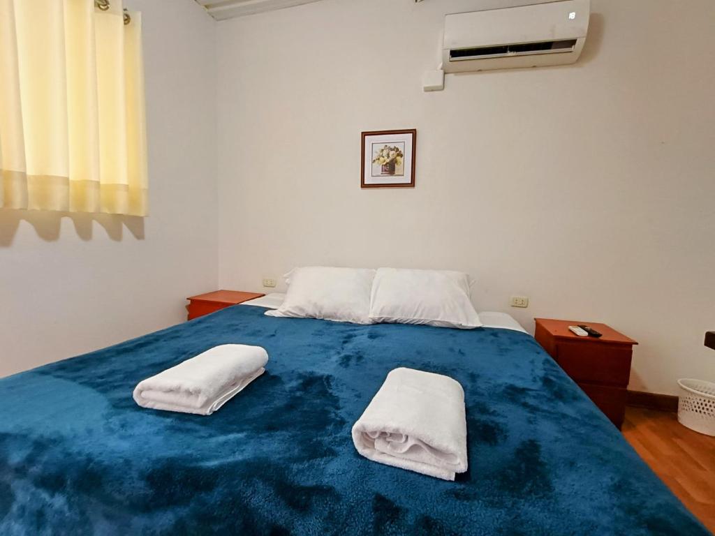 Cama o camas de una habitación en Samanai Wasi Hostel