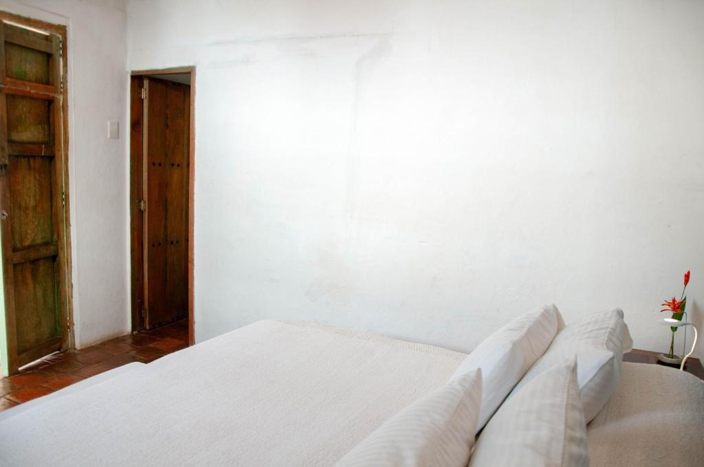 Postel nebo postele na pokoji v ubytování La Nube Posada