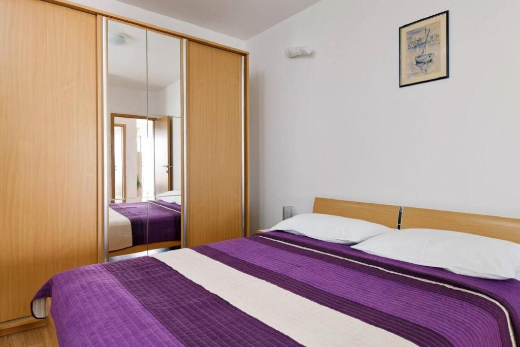 Posteľ alebo postele v izbe v ubytovaní Apartment Ljilja