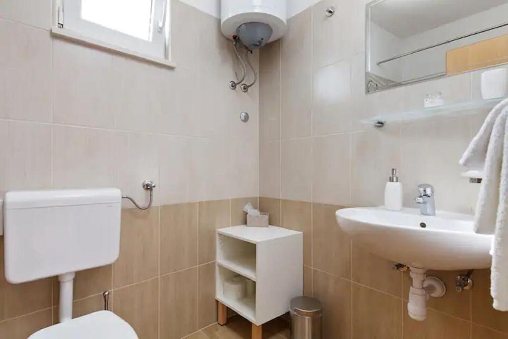Kúpeľňa v ubytovaní Apartment Ljilja
