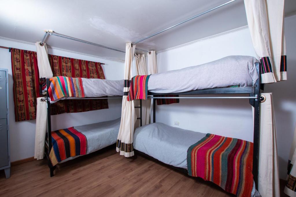 Postel nebo postele na pokoji v ubytování Puna Hostel