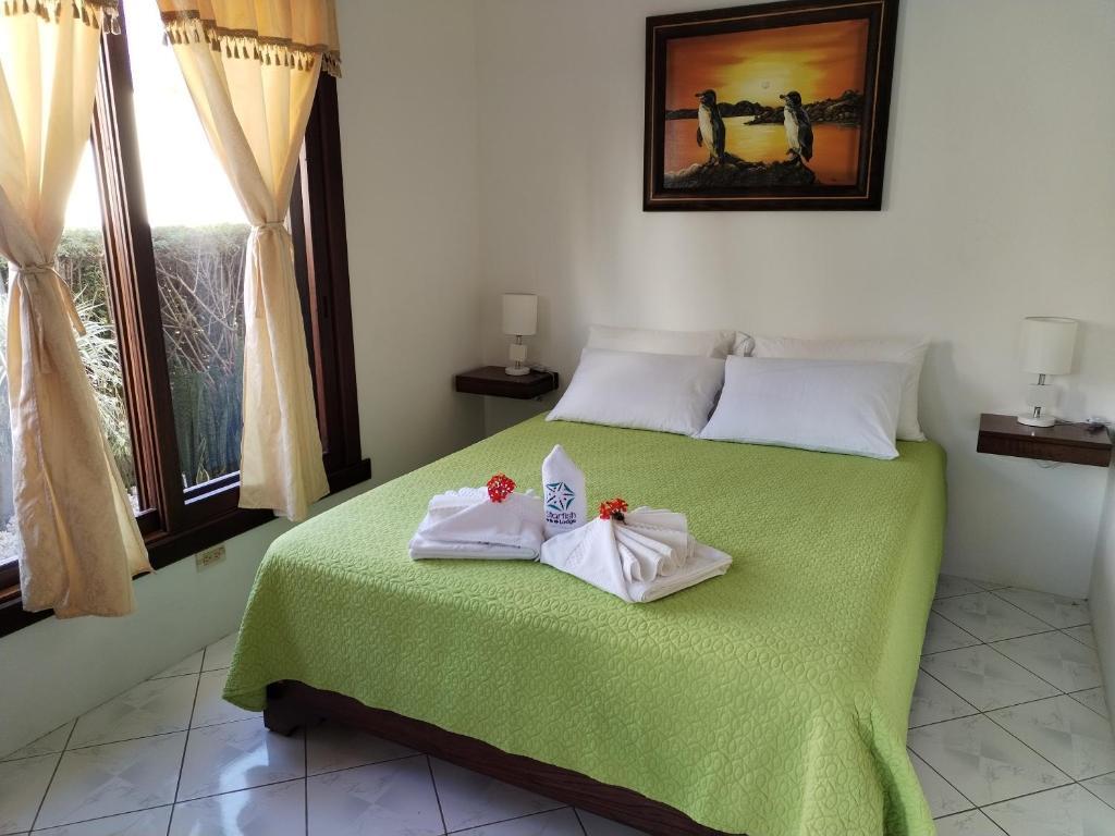 Postel nebo postele na pokoji v ubytování Hotel StarFish