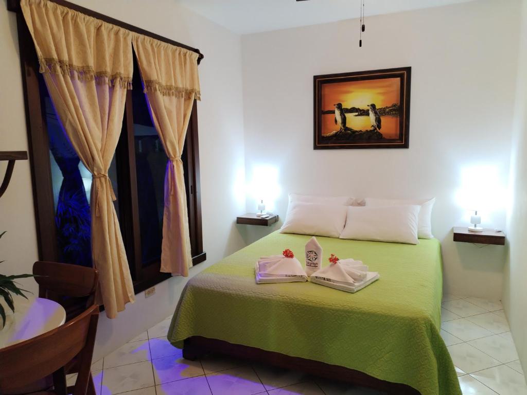 Postel nebo postele na pokoji v ubytování Hotel StarFish