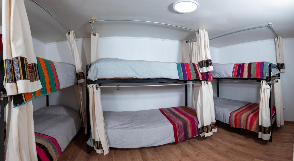 Postel nebo postele na pokoji v ubytování Puna Hostel