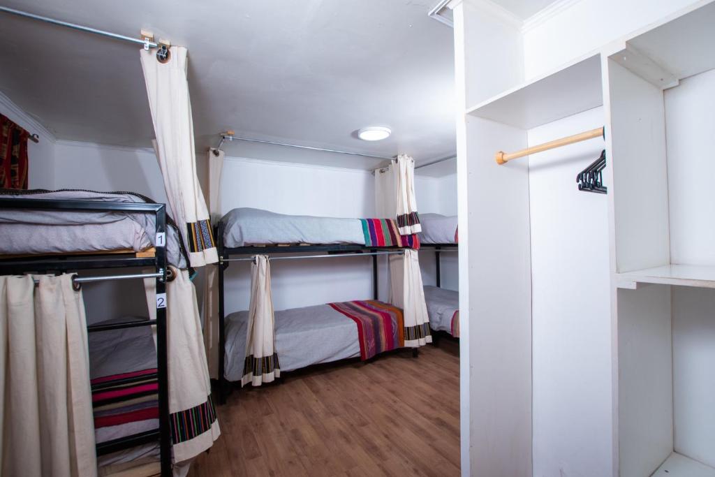 Postel nebo postele na pokoji v ubytování Puna Hostel