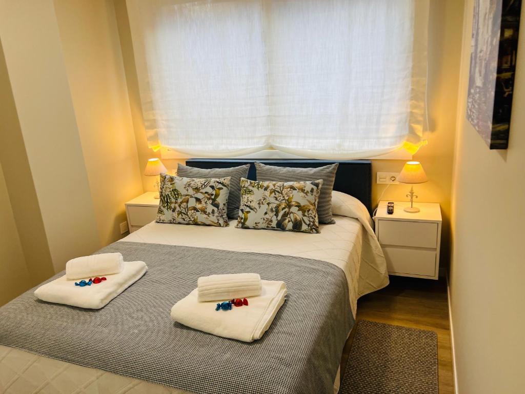 Postel nebo postele na pokoji v ubytování RioMar