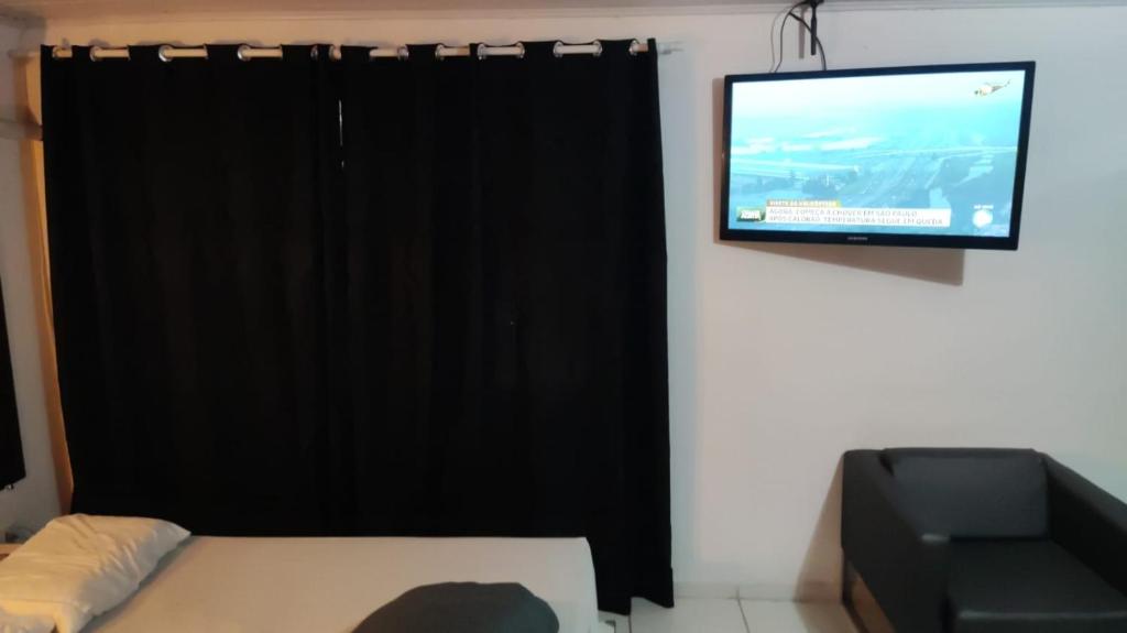 TV a/nebo společenská místnost v ubytování Hostel Pousada Curitiba Budget