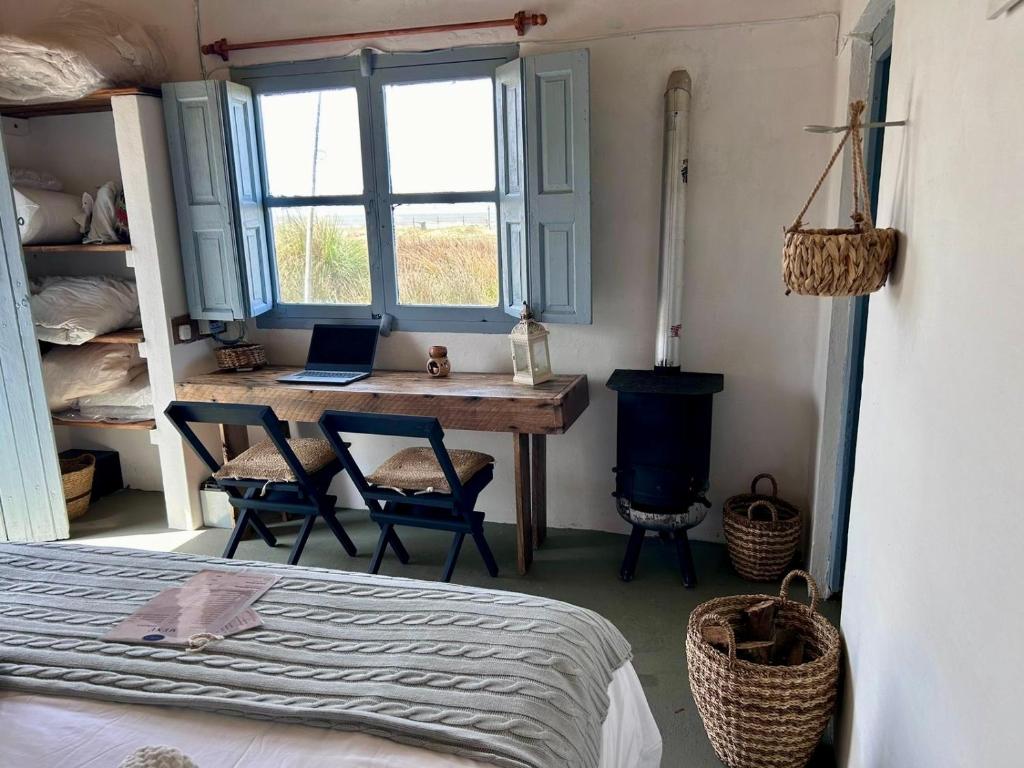 Postel nebo postele na pokoji v ubytování Carmela Suites Cabo Polonio