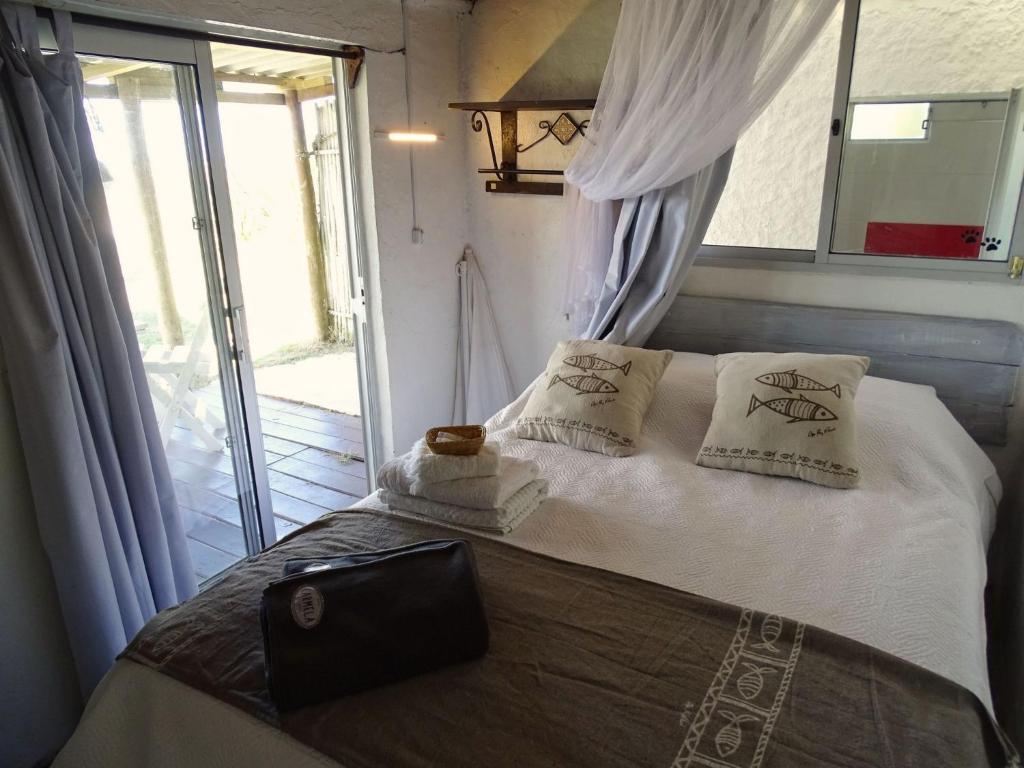 Postel nebo postele na pokoji v ubytování Carmela Suites Cabo Polonio