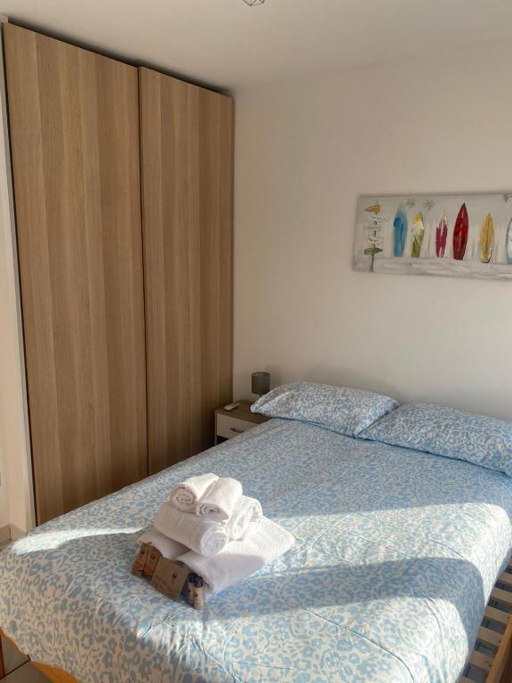 Postel nebo postele na pokoji v ubytování Appartamento due passi dal mare