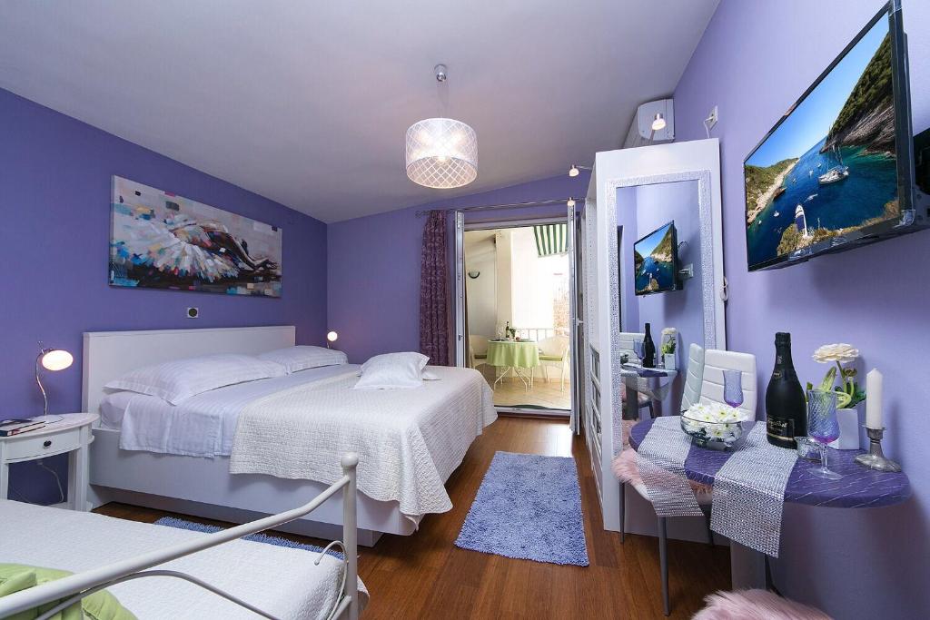 Posteľ alebo postele v izbe v ubytovaní Apartments Palmina