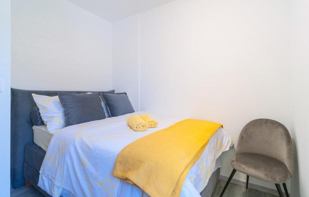 Posteľ alebo postele v izbe v ubytovaní Apartment Tom