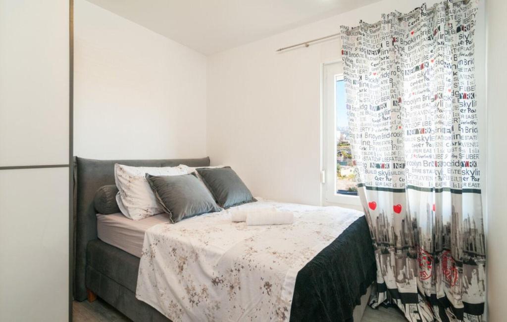 Posteľ alebo postele v izbe v ubytovaní Apartment Tom
