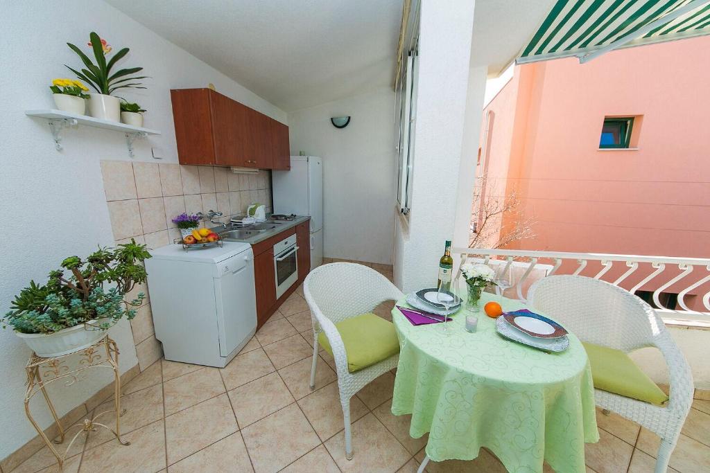 Kuchyňa alebo kuchynka v ubytovaní Apartments Palmina