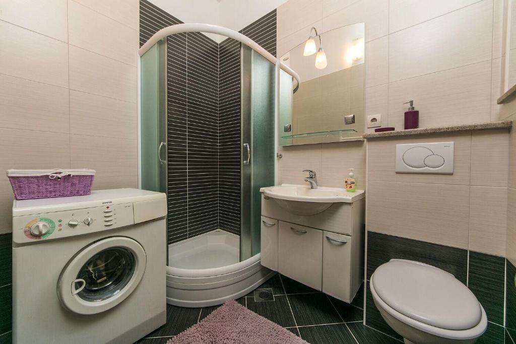 Kúpeľňa v ubytovaní Apartments Palmina